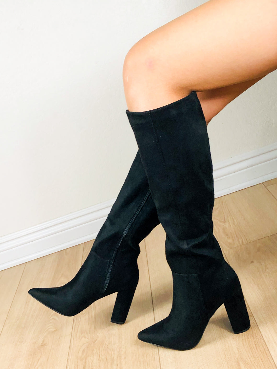 Black Boots - Suade material  Under the knee length  Inside is slightly padded  Pointed toe  Chunky heel